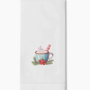Henry Handwork white linen hand towel with embroidered holiday hot cocoa mug and holly.