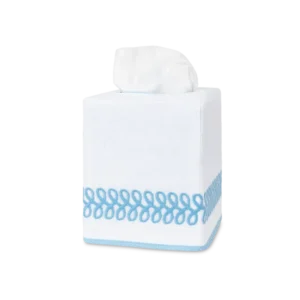 Matouk Astor Braid white linen tissue box cover with sky blue embroidered braid trim.