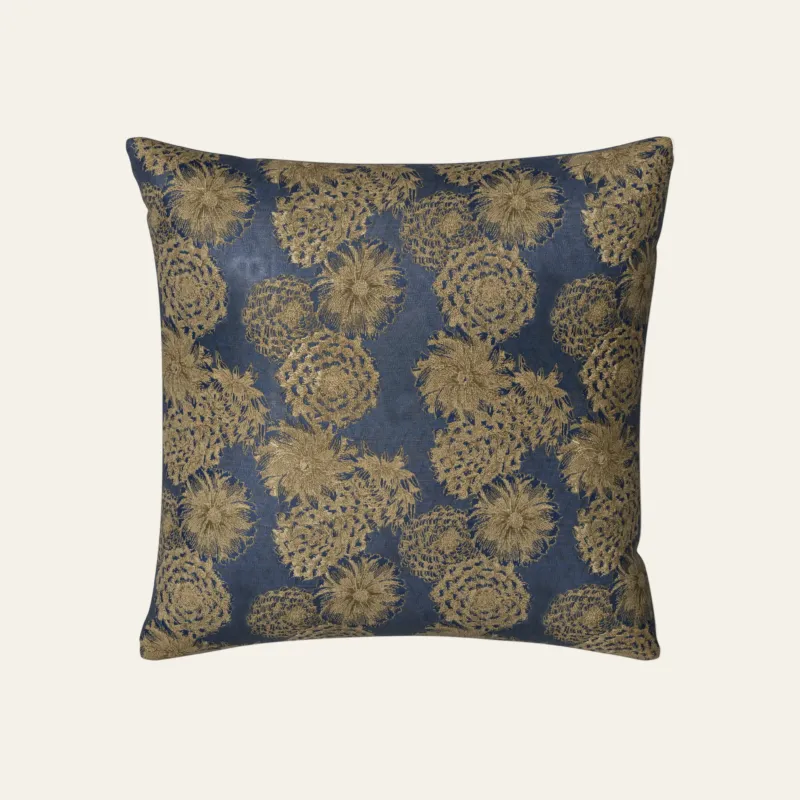 Ann Gish Chrysanthemum euro sham in navy with gold embroidered floral pattern.