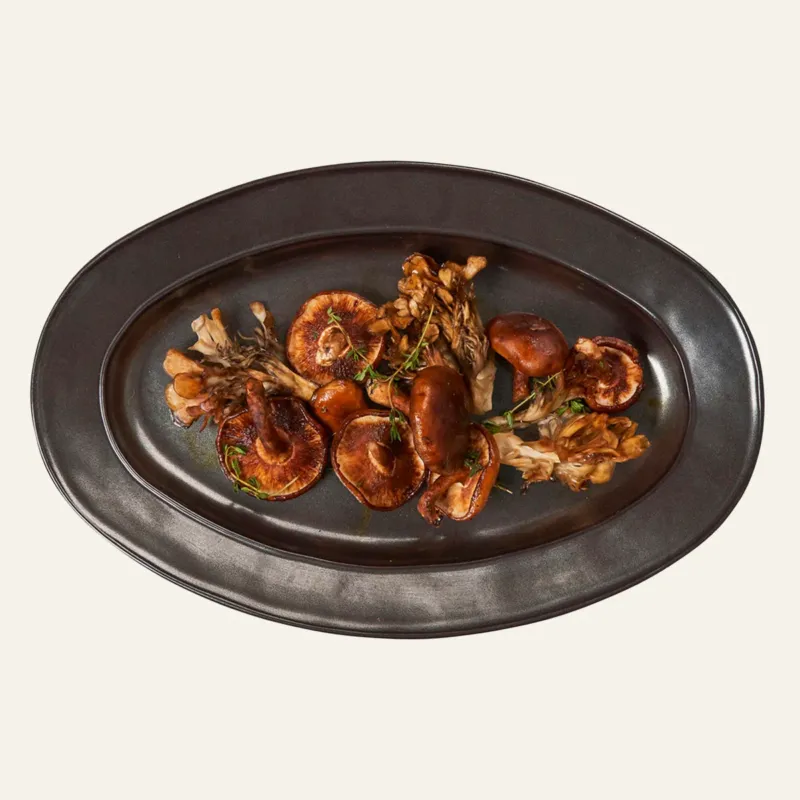 Juliska Pewter Stoneware oval platter with sautéed mushrooms and herbs.