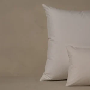 LETTO Giza Reserve Percale boudoir pillowcase in ivory, two sizes stacked.