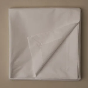 LETTO Giza Reserve Percale flat sheet folded in white on a neutral background.
