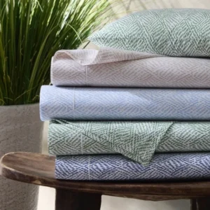 Matouk Duma Diamond Flat sheet color items in a stack