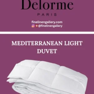 Yves Delorme Mediterranean Light duvet lying on a bed, showcasing elegant bed linen with a light, Mediterranean-inspired pattern.
