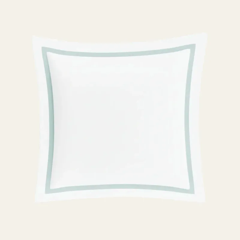 Ann Gish Ready-to-Bed 2.0 cotton sham in white with seafoam trim border.