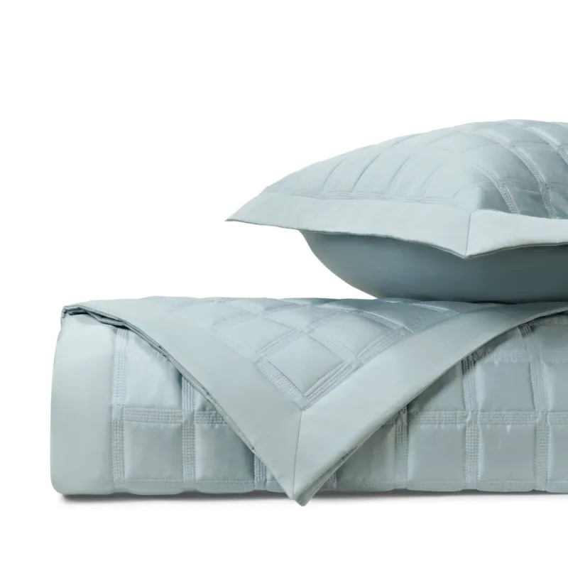 Home Treasures Athens quilted coverlet and euro sham set in mist blue with grid stitching.