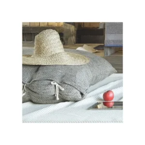Leitner Carasco grey woven linen bed skirt panels with white tie detail on styled bed.