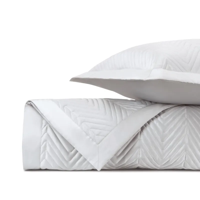 Home Treasures Charleston white quilted coverlet and sham set with chevron stitching.