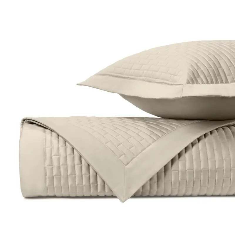 Home Treasures Mason quilted coverlet and euro sham set in ivory with basket-weave stitching.